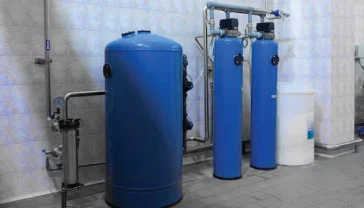 Technician installing various types of water heaters in a residential Dubai property