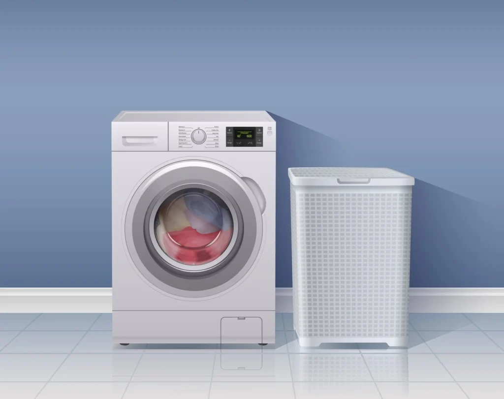 Technician installing a front load washing machine in a Dubai residential laundry area